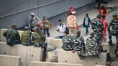 New Delhi, India - Feb. 13, 2024: Locals face difficulty as Delhi Police and other Security officials put barricades as a preventive measure after the Delhi Chalo protest call by farmers at Singhu Border (Delhi Haryana Border in New Delhi, India, on Tuesday, February 13, 2024. (Photo by Raj K Raj/ Hindustan Times) (Hindustan Times) New Delhi, India - Feb. 13, 2024: Locals face difficulty as Delhi Police and other Security officials put barricades as a preventive measure after the Delhi Chalo protest call by farmers at Singhu Border (Delhi Haryana Border in New Delhi, India, on Tuesday, February 13, 2024. (Photo by Raj K Raj/ Hindustan Times) (Hindustan Times)