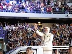 Prime Minister Narendra Modi waves to the people gathered during the 'Ahlan Modi' event at the Zayed Sports Stadium. (ANI) Prime Minister Narendra Modi waves to the people gathered during the 'Ahlan Modi' event at the Zayed Sports Stadium. (ANI)