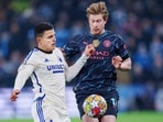 Manchester City's Belgian midfielder Kevin De Bruyne and FC Copenhagen's Norwegian forward Mohamed Elyounoussi vie for the ball Manchester City's Belgian midfielder Kevin De Bruyne and FC Copenhagen's Norwegian forward Mohamed Elyounoussi vie for the ball