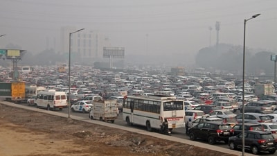 Commuters stuck in a massive traffic jam on the Delhi-Gurugram Expressway near Sirhaul toll plaza amid restrictions in vehicular traffic due to the farmers' 'Delhi Chalo' march. (ANI Photo) Commuters stuck in a massive traffic jam on the Delhi-Gurugram Expressway near Sirhaul toll plaza amid restrictions in vehicular traffic due to the farmers' 'Delhi Chalo' march. (ANI Photo)