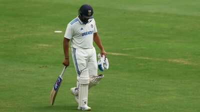 India's Rohit Sharma walks back to the pavilion after losing his wicket (REUTERS)