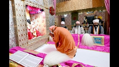 Chief minister offering prayers at Sant Ravidas temple in Varanasi on Wednesday. (HT Photo) Chief minister offering prayers at Sant Ravidas temple in Varanasi on Wednesday. (HT Photo)