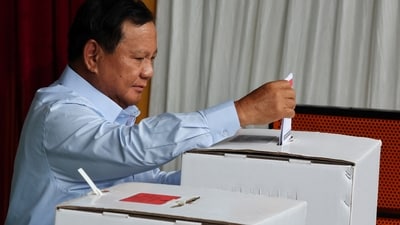 Presidential candidate Prabowo Subianto votes at a polling station during the general election in Indonesia. (REUTERS)