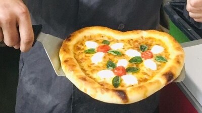Heart shaped pizza prepared by a bakery for Valentine's Day in Lucknow (HT Photo) Heart shaped pizza prepared by a bakery for Valentine's Day in Lucknow (HT Photo)