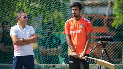 Spin-bowling all-rounder Washington Sundar has a word with chief selector Ajit Agarkar. Sundar could find a place in the squad, particularly if Ravindra Jadeja is deemed unfit for the match. (PTI) Spin-bowling all-rounder Washington Sundar has a word with chief selector Ajit Agarkar. Sundar could find a place in the squad, particularly if Ravindra Jadeja is deemed unfit for the match. (PTI)