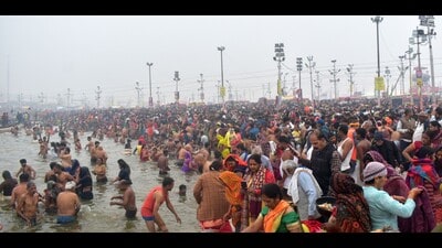 Pilgrims and seers taking a dip at ghats on the banks of Sangam at Magh Mela-2024 on the occasion of Basant Panchami on Wednesday. (HT) Pilgrims and seers taking a dip at ghats on the banks of Sangam at Magh Mela-2024 on the occasion of Basant Panchami on Wednesday. (HT)