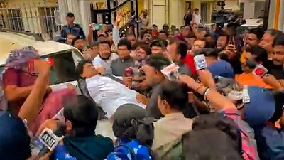 West Bengal Bharatiya Janata Party (BJP) President Sukanta Majumdar falls on the bonnet of a car in North 24 Parganas district on February 14. (PTI) West Bengal Bharatiya Janata Party (BJP) President Sukanta Majumdar falls on the bonnet of a car in North 24 Parganas district on February 14. (PTI)
