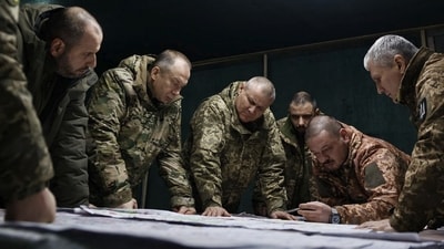 TOPSHOT - This handout photograph released on February 14, 2024 by the Press service of Ukrainian Armed Forces, shows Commander-in-Chief of the Armed Forces of Ukraine Oleksandr Syrsky (2nd L) and Ukraine's Defence Minister Rustem Umerov (L) visiting the frontline positions at an undisclosed location in eastern Ukraine. Newly appointed Ukrainian military chief said on February 14, 2024 that the situation on the front line was precarious, following a visit to positions near Avdiivka and Kupiansk. (Photo by Handout / Armed Forces of Ukraine / AFP) (AFP) TOPSHOT - This handout photograph released on February 14, 2024 by the Press service of Ukrainian Armed Forces, shows Commander-in-Chief of the Armed Forces of Ukraine Oleksandr Syrsky (2nd L) and Ukraine's Defence Minister Rustem Umerov (L) visiting the frontline positions at an undisclosed location in eastern Ukraine. Newly appointed Ukrainian military chief said on February 14, 2024 that the situation on the front line was precarious, following a visit to positions near Avdiivka and Kupiansk. (Photo by Handout / Armed Forces of Ukraine / AFP) (AFP)