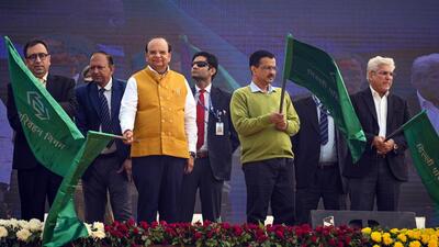 The LG and the CM flag off the buses on Wednesday. (Raj K Raj/HT Photo)