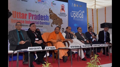 Uttar Pradesh chief minister Yogi Adityanath, Defence Minister Rajnath Singh and other dignitaries during a seminar on the defence industrial corridor as part of DEFEXPO20, at UP pavilion, Vrindavan Yojna, in Lucknow. (HT File)
