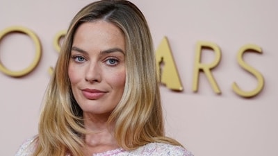 Greta Gerwig and Margot Robbie, whose snubs for best director and best actress respectively, for Barbie caused a major stir, both showed up for the nominations they did get, and were all smiles. (AP)