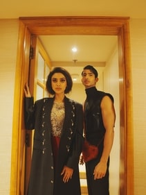 Davianna in jacket from Diermeiss by The Dragon Lady and dress from Eesum. Nitesh in vest from Pawan Sachdeva.