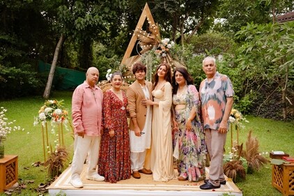 Surbhi and Karan with their families during the roka