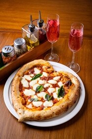 A heart-shaped Neo-Neapolitan pizza A heart-shaped Neo-Neapolitan pizza