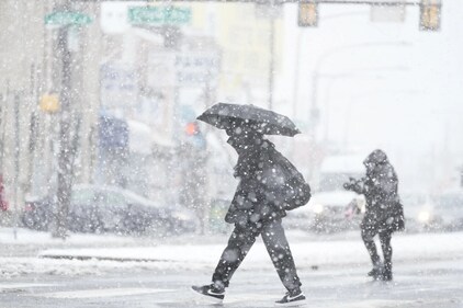 A quick-moving winter storm battered cities in the Northeast with snowfall, (AP) A quick-moving winter storm battered cities in the Northeast with snowfall, (AP)