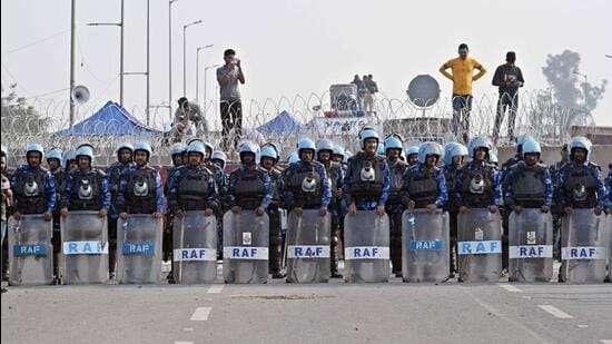 Security forces at the Singhu border in the city on Wednesday. (Sanjeev Verma/HT Photo)
