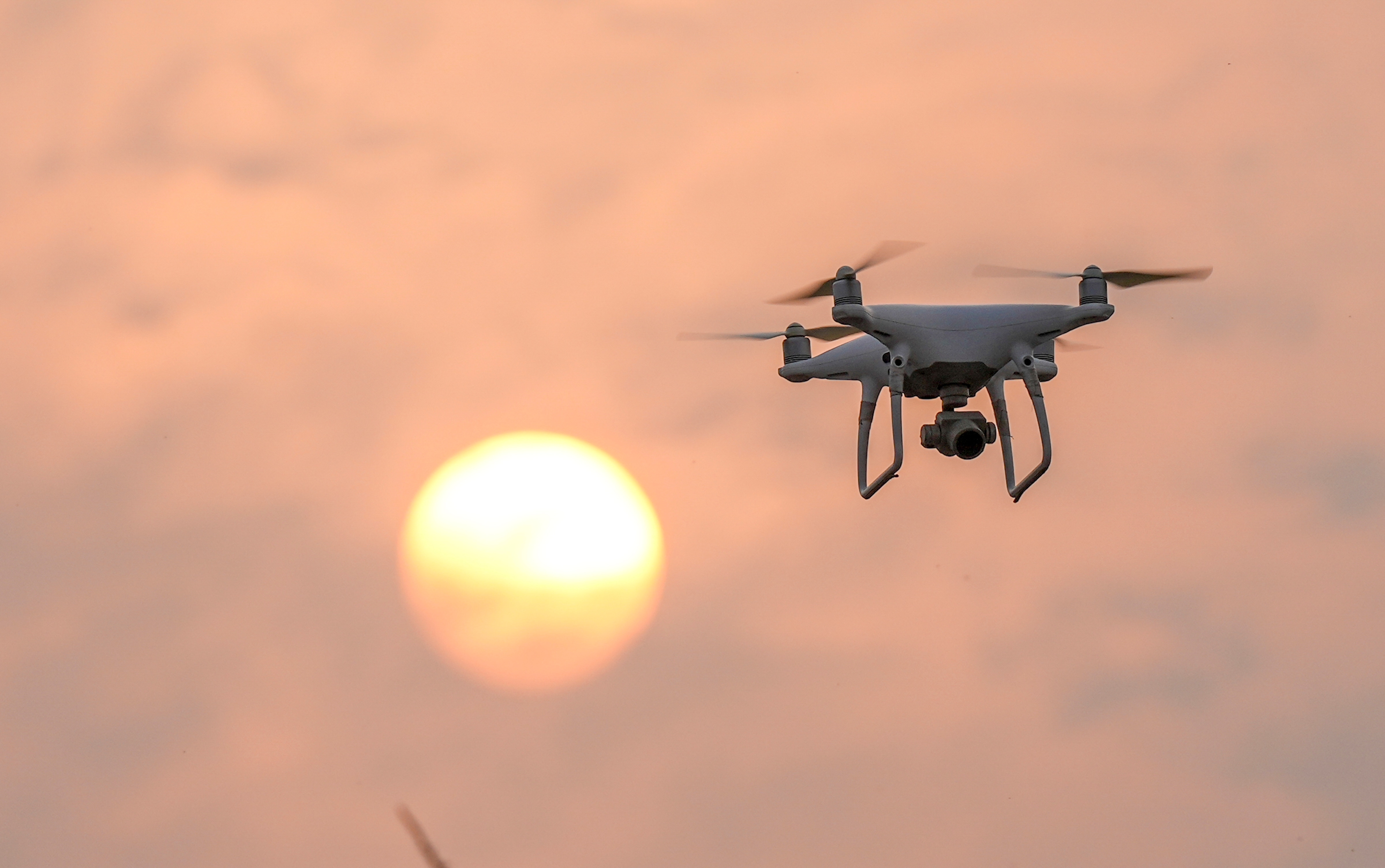 A drone being used for surveillance and dropping tear gas shells at Singhu border in view of farmers' protest march, in New Delhi, Tuesday. (PTI) (HT_PRINT) A drone being used for surveillance and dropping tear gas shells at Singhu border in view of farmers' protest march, in New Delhi, Tuesday. (PTI) (HT_PRINT)