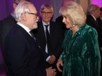 Britain's Queen Camilla shakes hands with Scottish actor Brian Cox at the Celebration Of Shakespeare event at Grosvenor House in London on February 14, 2024. She witnessed performances by Judi Dench, Gary Oldman and Robert Lindsay at a star-studded event celebrating the work of William Shakespeare.(AFP)