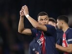 Paris Saint-Germain's French forward Kylian Mbappe celebrates the victory at the end of the UEFA Champions League round of 16 first leg match vs Real Sociedad Paris Saint-Germain's French forward Kylian Mbappe celebrates the victory at the end of the UEFA Champions League round of 16 first leg match vs Real Sociedad