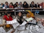 Officials count ballots at a polling station in Lahore, Pakistan, on Thursday, Feb. 8, 2024. Pakistan suspended mobile phone services as voters lined up to cast ballots in its general election Thursday, defending the measure as a way to maintain order even though critics said it would curb vital access to information during the controversial polls. Photographer: Betsy Joles/Bloomberg Officials count ballots at a polling station in Lahore, Pakistan, on Thursday, Feb. 8, 2024. Pakistan suspended mobile phone services as voters lined up to cast ballots in its general election Thursday, defending the measure as a way to maintain order even though critics said it would curb vital access to information during the controversial polls. Photographer: Betsy Joles/Bloomberg