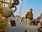 Bharat Bandh news: A police barricade secured with locks at Ghazipur border in view of farmers' protest march, in Ghaziabad, Thursday, Feb. 15, 2024. (PTI Photo)(PTI02_15_2024_000293A)