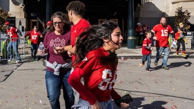 People flee after shots were fired near the Kansas City Chiefs' Super Bowl LVIII victory parade on February 14, 2024, in Kansas City, Missouri. (Photo by ANDREW CABALLERO-REYNOLDS / AFP) (AFP) People flee after shots were fired near the Kansas City Chiefs' Super Bowl LVIII victory parade on February 14, 2024, in Kansas City, Missouri. (Photo by ANDREW CABALLERO-REYNOLDS / AFP) (AFP)