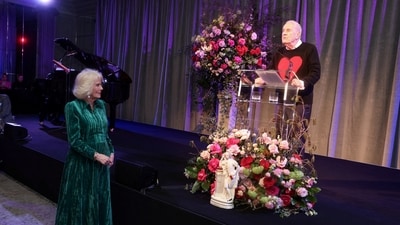 Britain Queen Camilla smiles during a speech by host Gyles Brandreth as she attends the Celebration Of Shakespeare at Grosvenor House in London, At the event, Judi Dench said it was ‘lovely’ to attend the event and gave a performance of Shakespeare’s Sonnet 116, describing the Bard as “the person in our family who is called the man who pays the rent”. (via REUTERS)