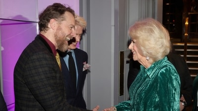 Britain Queen Camilla smiles as she shakes hands with actor-director Samuel West at the Celebration Of Shakespeare event. It is being reported this was due to be a joint event for King Charles and his wife, but since his cancer diagnosis he has postponed all public-facing duties. (via REUTERS)