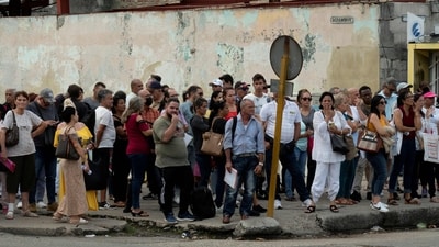 Cubans queue to enter the Spanish embassy in Havana on January 9, 2024. The US Customs and Border Protection agency said on January 27, 2024, that it had registered some 153,600 irregular entries from Cuba in 2023. Another 67,000 entered legally under a family reunification program introduced a year ago by the administration of Joe Biden. (AFP) Cubans queue to enter the Spanish embassy in Havana on January 9, 2024. The US Customs and Border Protection agency said on January 27, 2024, that it had registered some 153,600 irregular entries from Cuba in 2023. Another 67,000 entered legally under a family reunification program introduced a year ago by the administration of Joe Biden. (AFP)