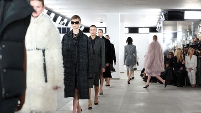Models present creations by Michael Kors during New York Fashion Week. (Photo by Charly TRIBALLEAU / AFP) Models present creations by Michael Kors during New York Fashion Week. (Photo by Charly TRIBALLEAU / AFP)