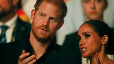 Harry, Duke of Sussex and patron of the Invictus Games (L), and his wife Meghan, Duchess of Sussex, attend the closing ceremony of the 2023 Invictus Games in Duesseldorf, western Germany on September 16, 2023. The Invictus Games, an international sports competition for wounded soldiers founded by British royal Prince Harry in 2014, was taking place from September 9 to 16, 2023 in Duesseldorf. (Photo by LEON KUEGELER / AFP) (AFP) Harry, Duke of Sussex and patron of the Invictus Games (L), and his wife Meghan, Duchess of Sussex, attend the closing ceremony of the 2023 Invictus Games in Duesseldorf, western Germany on September 16, 2023. The Invictus Games, an international sports competition for wounded soldiers founded by British royal Prince Harry in 2014, was taking place from September 9 to 16, 2023 in Duesseldorf. (Photo by LEON KUEGELER / AFP) (AFP)
