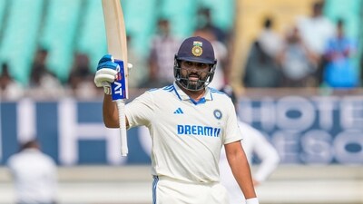 India’s skipper Rohit Sharma raises his bat. (AP) India’s skipper Rohit Sharma raises his bat. (AP)