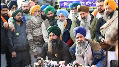 Kisan Mazdoor Sangharsh Committee (KMSC) leader Sarwan Singh Pandher (right) addressing the media at the protest site at Shambhu on the Punjab-Haryana border on Thursday. (Ravi Kumar/HT) Kisan Mazdoor Sangharsh Committee (KMSC) leader Sarwan Singh Pandher (right) addressing the media at the protest site at Shambhu on the Punjab-Haryana border on Thursday. (Ravi Kumar/HT)