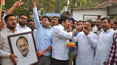 Nationalist Congress Party (NCP) workers celebrate following the Maharashtra Assembly Speaker's decision, outside the party office, in Mumbai on Thursday. (ANI) Nationalist Congress Party (NCP) workers celebrate following the Maharashtra Assembly Speaker's decision, outside the party office, in Mumbai on Thursday. (ANI)