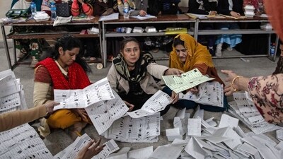 Officials count ballots at a polling station in Lahore, Pakistan, on Thursday, Feb. 8, 2024. Pakistan suspended mobile phone services as voters lined up to cast ballots in its general election Thursday, defending the measure as a way to maintain order even though critics said it would curb vital access to information during the controversial polls. Photographer: Betsy Joles/Bloomberg (Bloomberg) Officials count ballots at a polling station in Lahore, Pakistan, on Thursday, Feb. 8, 2024. Pakistan suspended mobile phone services as voters lined up to cast ballots in its general election Thursday, defending the measure as a way to maintain order even though critics said it would curb vital access to information during the controversial polls. Photographer: Betsy Joles/Bloomberg (Bloomberg)