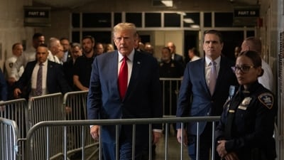 Former US President Donald Trump, center left, arrives at New York State Supreme Court in New York, US, on Thursday, Feb. 15, 2024. A judge in New York ruled Donald Trump's trial over alleged hush-money payments to a porn star will start as planned on March 25, making it the first of four criminal cases against the former president to go before a jury. Photographer: Jeenah Moon/Bloomberg (Bloomberg) Former US President Donald Trump, center left, arrives at New York State Supreme Court in New York, US, on Thursday, Feb. 15, 2024. A judge in New York ruled Donald Trump's trial over alleged hush-money payments to a porn star will start as planned on March 25, making it the first of four criminal cases against the former president to go before a jury. Photographer: Jeenah Moon/Bloomberg (Bloomberg)