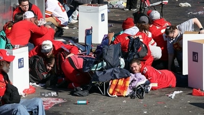 People take cover during a shooting at Union Station during the Kansas City Chiefs Super Bowl LVIII victory parade on February 14, 2024 in Kansas City, Missouri. Several people were shot and two people were detained after a rally celebrating the Chiefs Super Bowl victory. Jamie Squire/Getty Images/AFP (Photo by JAMIE SQUIRE / GETTY IMAGES NORTH AMERICA / Getty Images via AFP) (Getty Images via AFP) People take cover during a shooting at Union Station during the Kansas City Chiefs Super Bowl LVIII victory parade on February 14, 2024 in Kansas City, Missouri. Several people were shot and two people were detained after a rally celebrating the Chiefs Super Bowl victory. Jamie Squire/Getty Images/AFP (Photo by JAMIE SQUIRE / GETTY IMAGES NORTH AMERICA / Getty Images via AFP) (Getty Images via AFP)