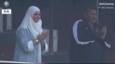 Sarfaraz Khan's wife and father react after he gets off the mark in Test cricket Sarfaraz Khan's wife and father react after he gets off the mark in Test cricket