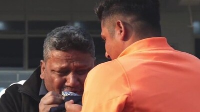 Sarfaraz Khan's father Naushad cries holding his son's Test cap Sarfaraz Khan's father Naushad cries holding his son's Test cap