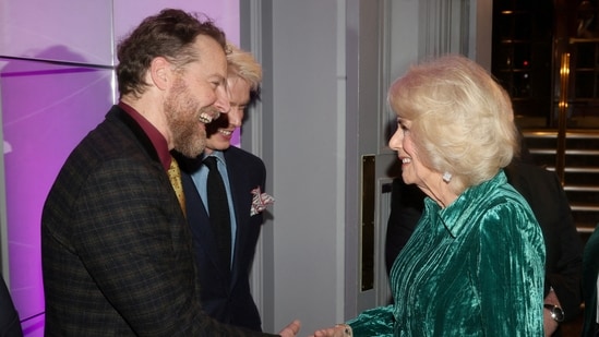 Britain Queen Camilla smiles as she shakes hands with actor-director Samuel West at the Celebration Of Shakespeare event. It is being reported this was due to be a joint event for King Charles and his wife, but since his cancer diagnosis he has postponed all public-facing duties.(via REUTERS)