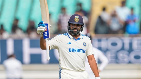 India’s skipper Rohit Sharma raises his bat. (AP)