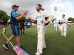 New Zealand's Kane Williamson (R) is congratulated by captain Tim Southee (L) after their team's victory New Zealand's Kane Williamson (R) is congratulated by captain Tim Southee (L) after their team's victory