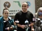 Robert DuBoise, 56, meets reporters with his sister Harriet, left, and mother Myra, right, following his release at the Hardee County Correctional Institute in Hardee County, Fla. Robert DuBoise, 56, meets reporters with his sister Harriet, left, and mother Myra, right, following his release at the Hardee County Correctional Institute in Hardee County, Fla.