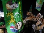 Pakistan Elections: Supporters of Pakistan's former prime minister Nawaz Sharif's party 'Pakistan Muslim League-N, celebrate victory of a candidate of their party in the parliamentary elections, in Peshawar, Pakistan.