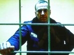 Russian opposition leader Alexei Navalny is seen on a screen via video link from the IK-2 corrective penal colony in Pokrov in May 2022.