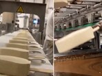 The image is taken from a video that shows how ice cream sticks are mass-produced. The image is taken from a video that shows how ice cream sticks are mass-produced.
