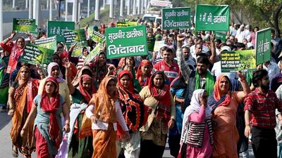 Farmers under the banner of Bharatiya Kisan Parishad protest outside the NTPC office in Sector 24 on Friday, in response to a nationwide rural strike call given by farmer unions. (Sunil Ghosh/HT Photo) Farmers under the banner of Bharatiya Kisan Parishad protest outside the NTPC office in Sector 24 on Friday, in response to a nationwide rural strike call given by farmer unions. (Sunil Ghosh/HT Photo)
