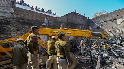 New Delhi, India - February 16, 2024: A View of paint godown and near by shops that caught fire last night, resulting in the death of 11 people in Alipur, in New Delhi on Friday, February 16, 2024. (Photo by Raj K Raj/Hindustan Times) (Hindustan Times)