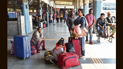Passengers stranded at the Sector-43 ISBT in Chandigarh after buses stayed off roads in response to the farmers’ ‘Bharat Bandh’ call on Friday. (Keshav Singh/HT) Passengers stranded at the Sector-43 ISBT in Chandigarh after buses stayed off roads in response to the farmers’ ‘Bharat Bandh’ call on Friday. (Keshav Singh/HT)