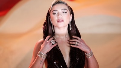 British actress Florence Pugh poses on the red carpet. With its sweeping landscapes and dark mood, critics lauded the first film in reviews as a visual spectacle. (AFP) British actress Florence Pugh poses on the red carpet. With its sweeping landscapes and dark mood, critics lauded the first film in reviews as a visual spectacle. (AFP)
